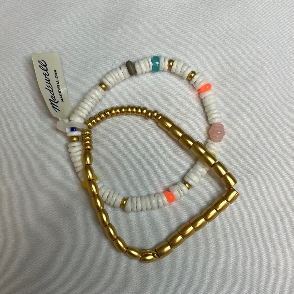 Set of two Madewell stretch bracelets.In Gold and white with colorful stones.